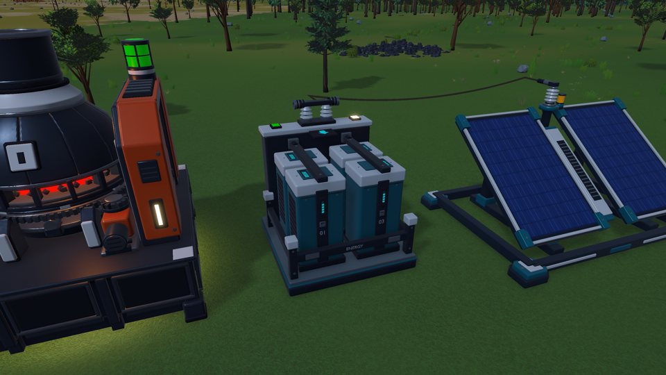 A generator, battery storage, and solar panels beside the factory