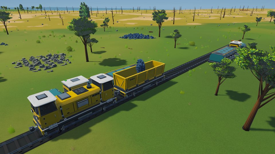 A yellow cargo train running across the grassland